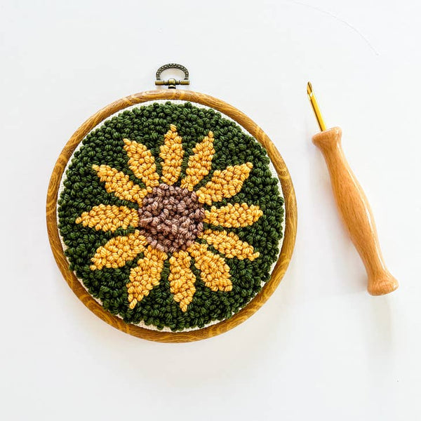 punch needle kit featuring a sunflower