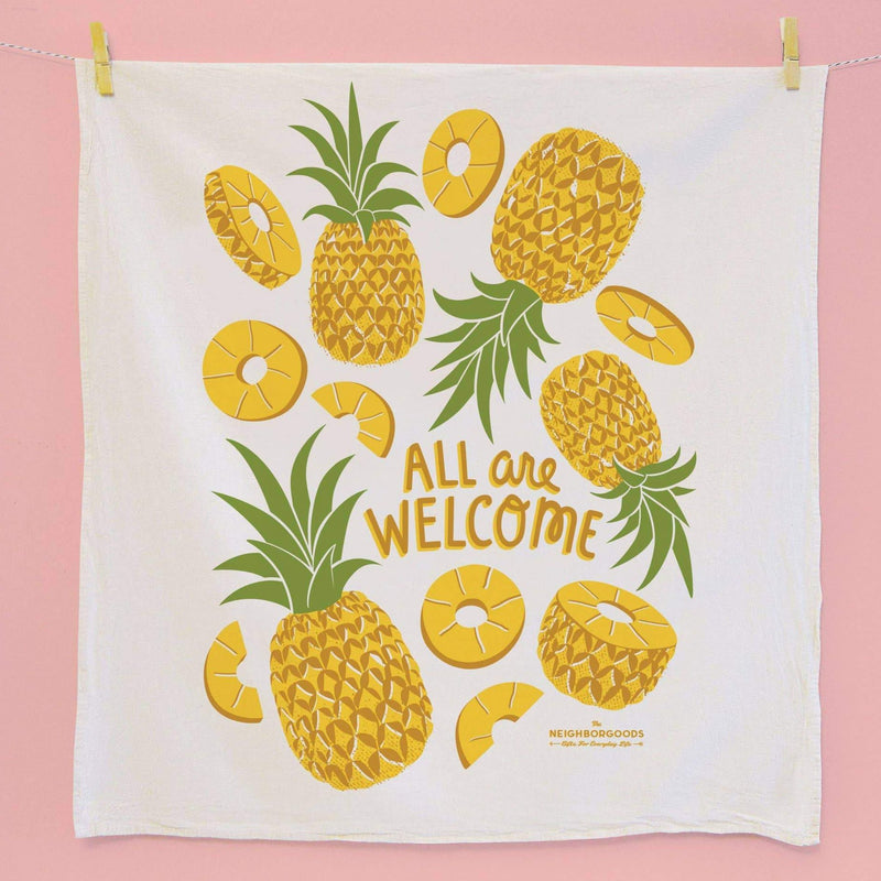 Tea towel with pineapple design that says all are welcome